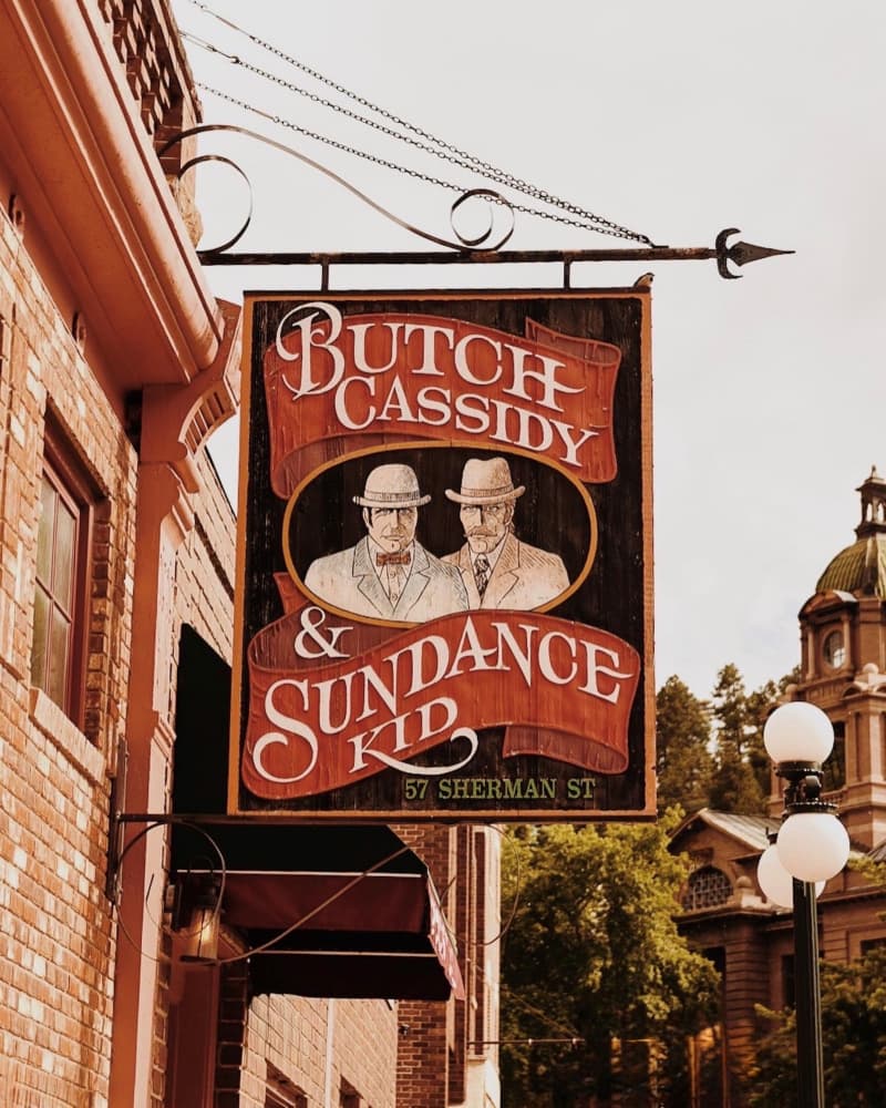 Butch Cassidy Sundance Sign by Del Mundo Imagery — canvas wall art