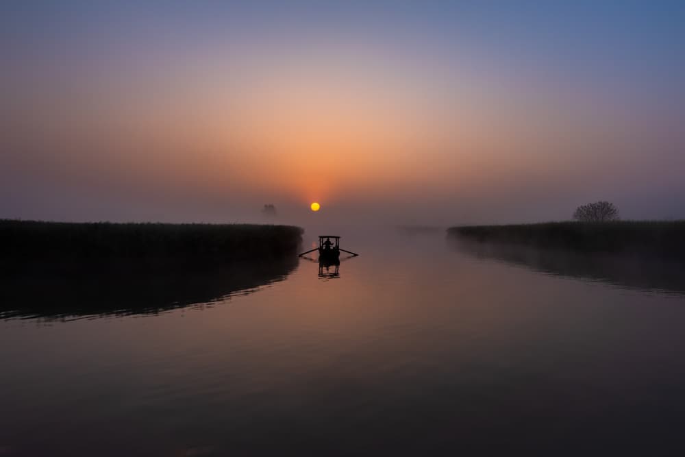 Misty River Sunrise by Jay Zhu — canvas wall art