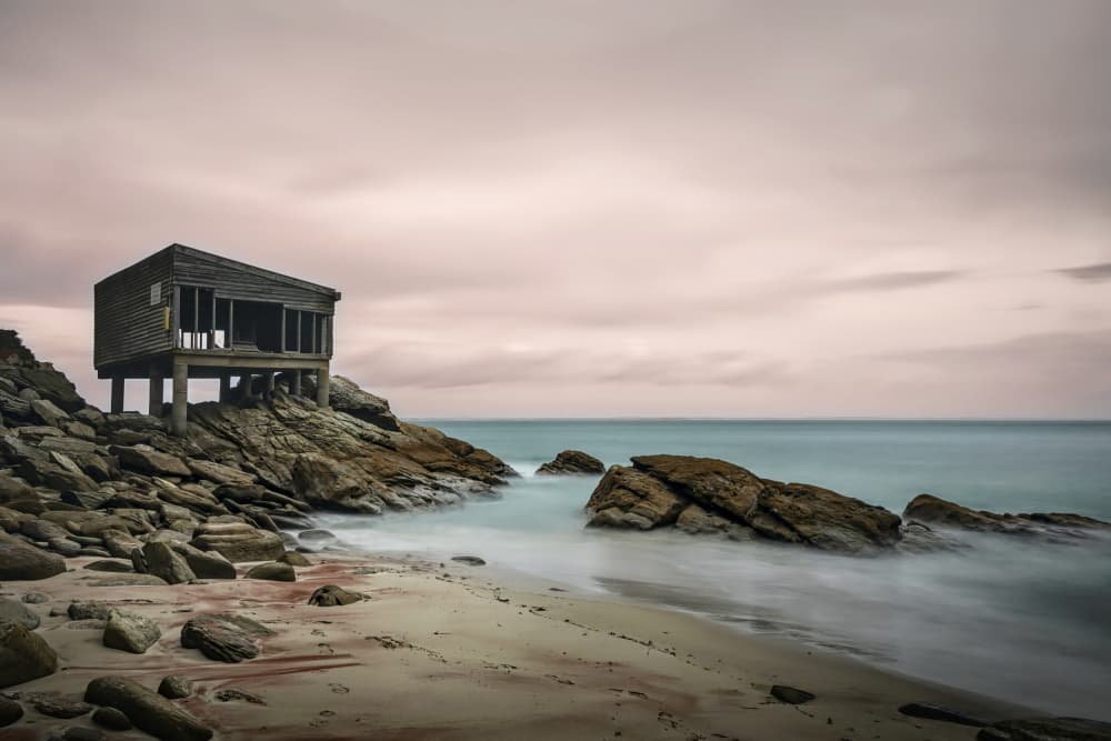 Moody Coastal Shack by av peteghium — canvas wall art