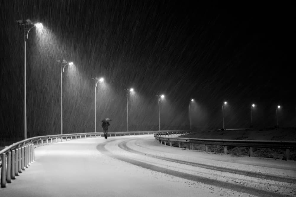 Lone Figure Snowy Road by Hosein Babaei — canvas wall art