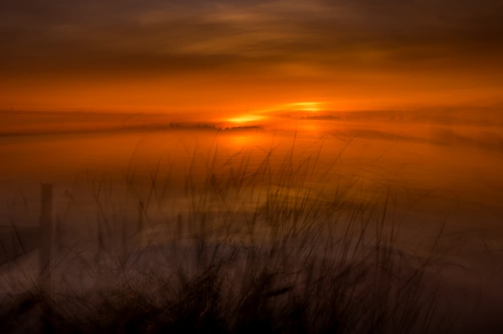 Hazy Ocean Sunset by Ina Bouhuijzen — canvas wall art