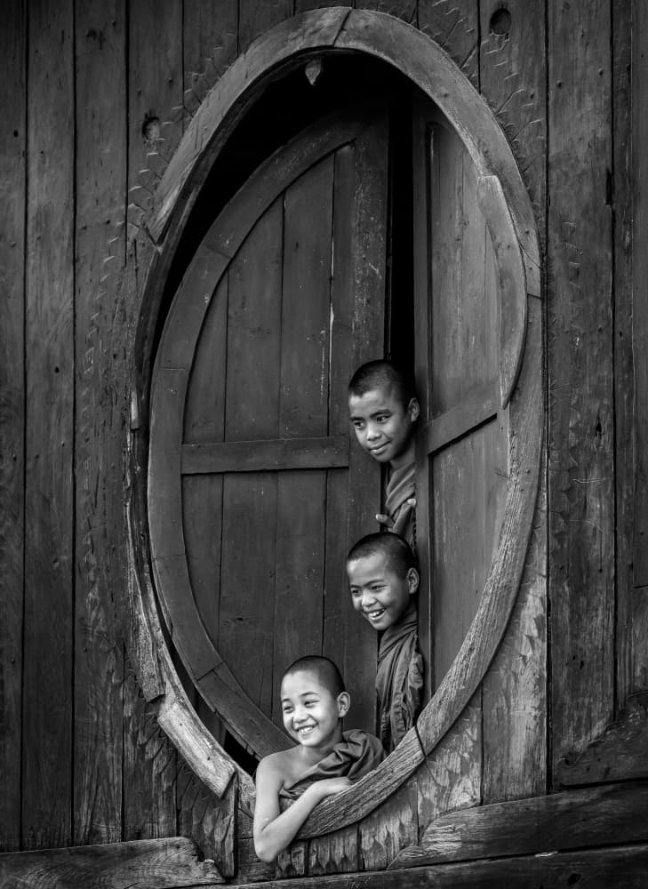 Monks Peeking Window by ADIREK M — canvas wall art