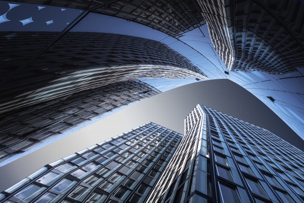 Towering Urban Reflections by Michael Eßig — canvas wall art