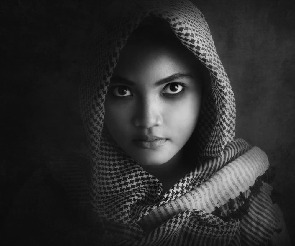 Intense Hooded Gaze by Ivan Marlianto — canvas wall art