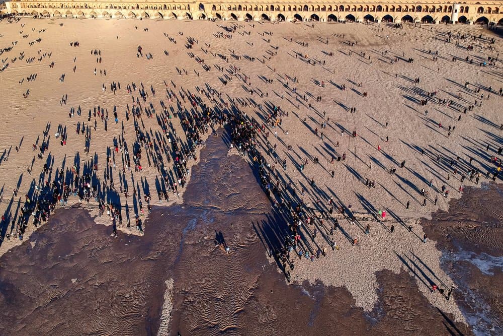 Crowds Under Ancient Arches by Hamid Jamshidian — canvas wall art