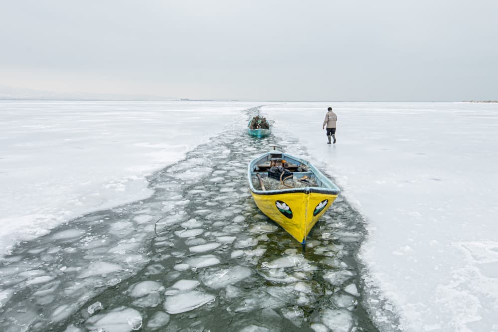 Navigating Frozen Waters by Mustafa Binol — canvas wall art