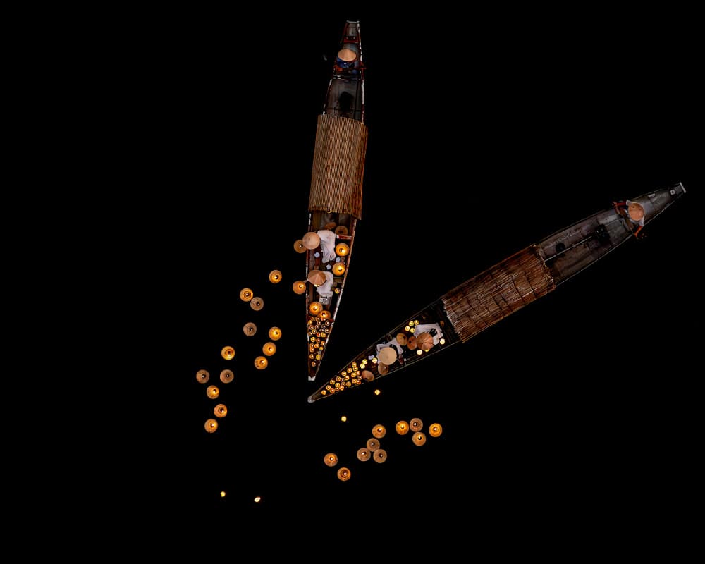 Floating Lantern Boats by John J. Chen — canvas wall art