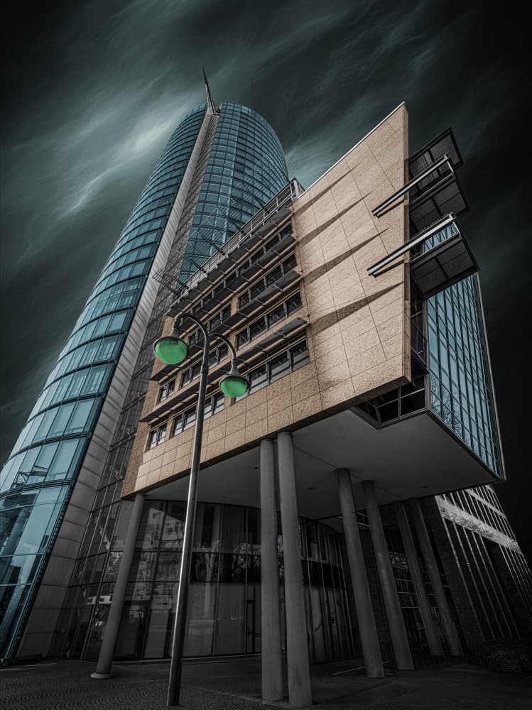 Skyscraper Under Stormy Sky by Roland M Schwerdtfeger — canvas wall art