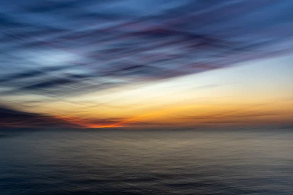 Ethereal Ocean Sunset by Franco Tessarolo — canvas wall art
