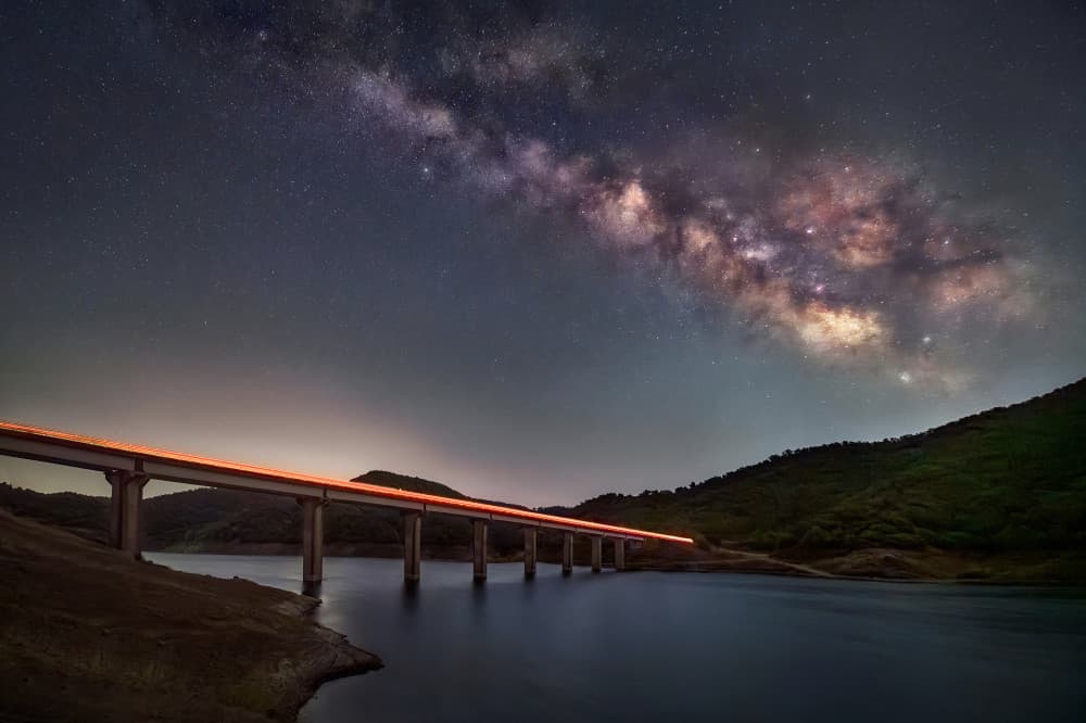 Milky Way Over Bridge by Juan Luis Seco — canvas wall art