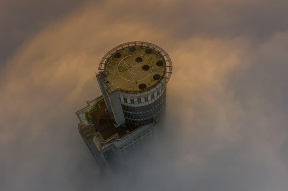 Skyscraper Above Clouds by Or Adar — canvas wall art