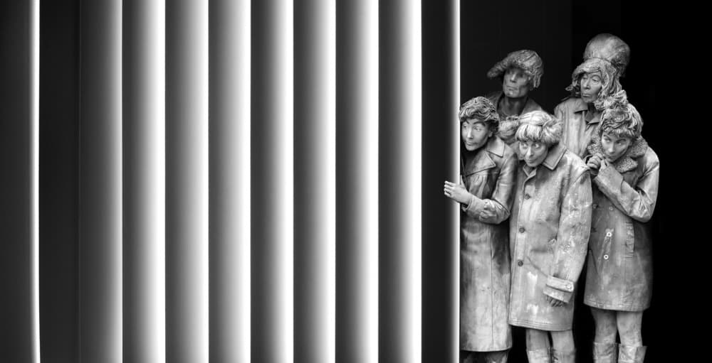 Somber Figures Looking Out by Huib Limberg — canvas wall art