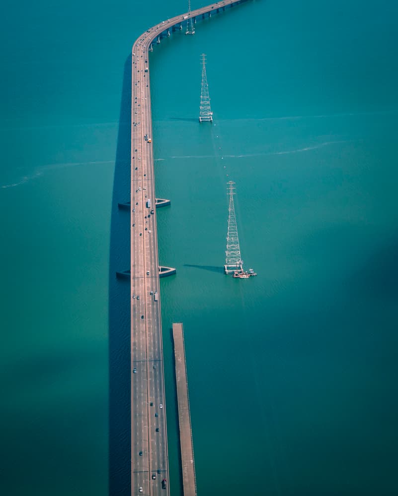 Long Bridge Over Ocean by Wei (David) Dai — canvas wall art