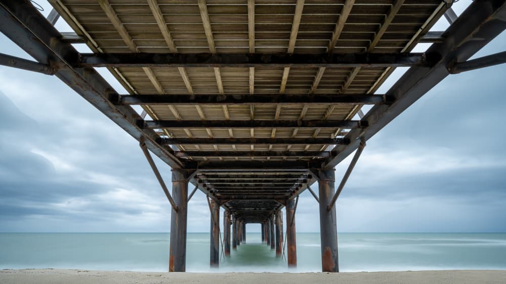 Calm Pier Perspective by Jean Vandijck — canvas wall art