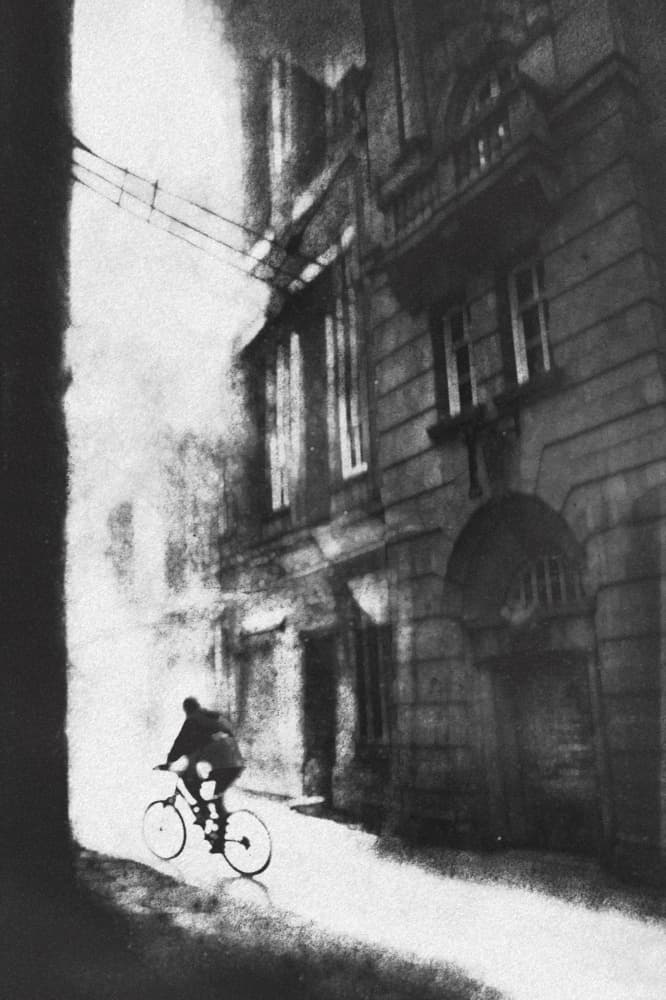 Mysterious Street Cyclist by Amer Jassim — canvas wall art