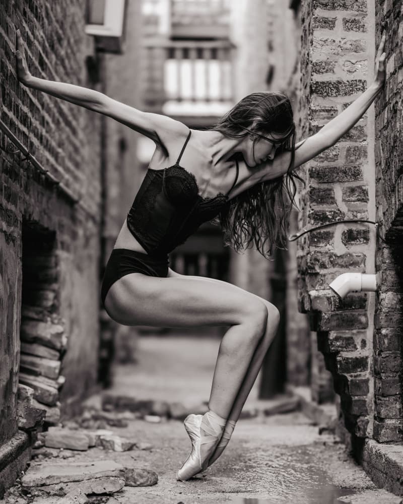 Ballerina in Urban Alley by Tyler McAuley — canvas wall art