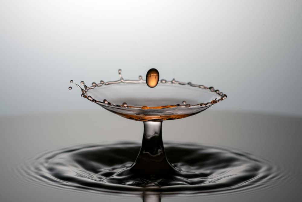 Amber Crown Splash by Yousef Sayadi — canvas wall art