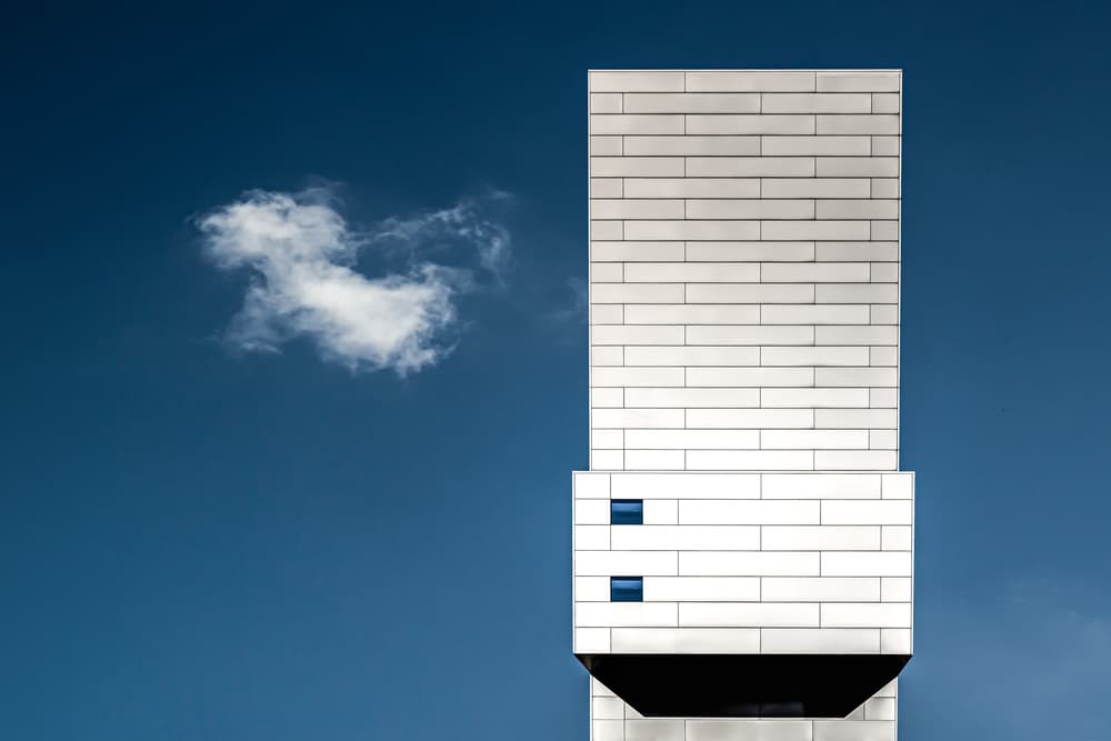 White Building Blue Sky by Luc Vangindertael (laGrange) — canvas wall art