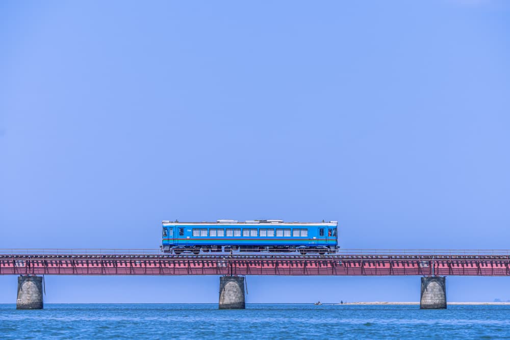 Blue Train on Bridge by YusukeMatsumoto — canvas wall art