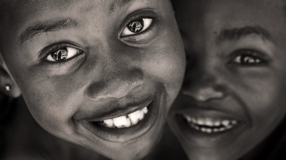 Smiling African Children by Lou Urlings — canvas wall art