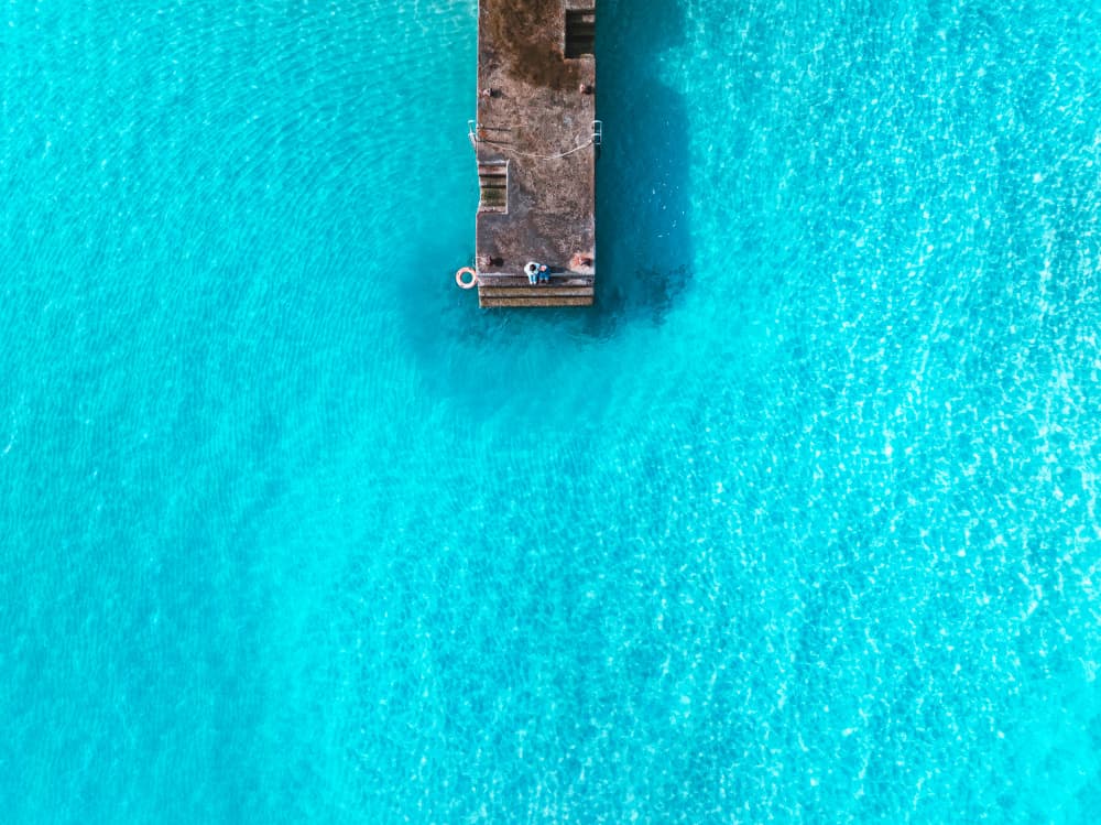 Turquoise Pier Solitude by Bong Goo Kang — canvas wall art