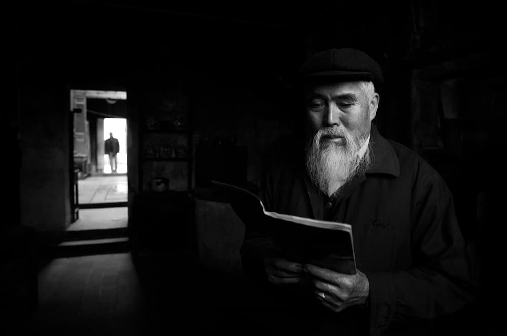 Thoughtful Man Reading by Ali Al-Jazeri — canvas wall art