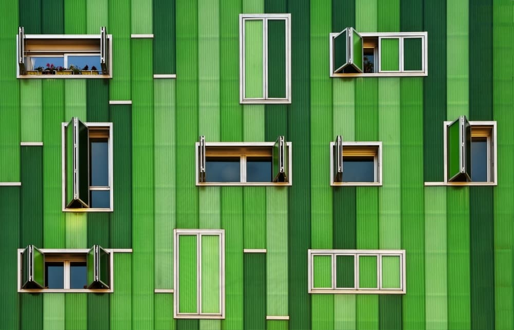 Vibrant Green Facade by Carlos Pardo — canvas wall art