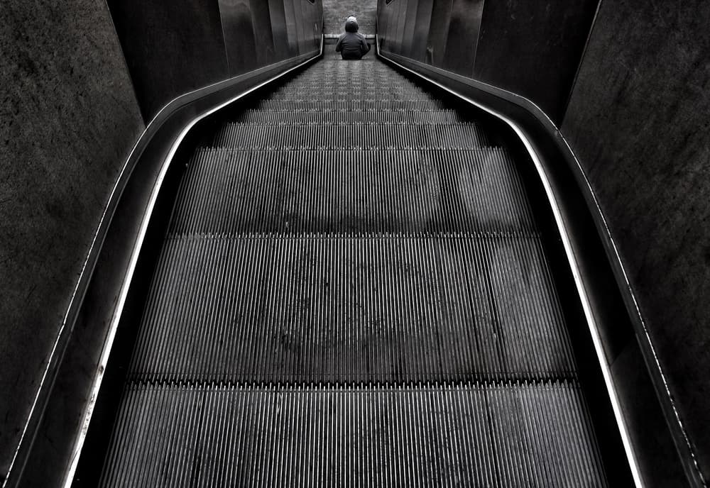 Solitary Escalator Down by Ali Ayer — canvas wall art