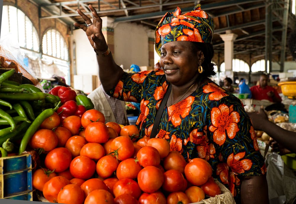 Smiling Market Woman by Lorenzo Grifantini — canvas wall art