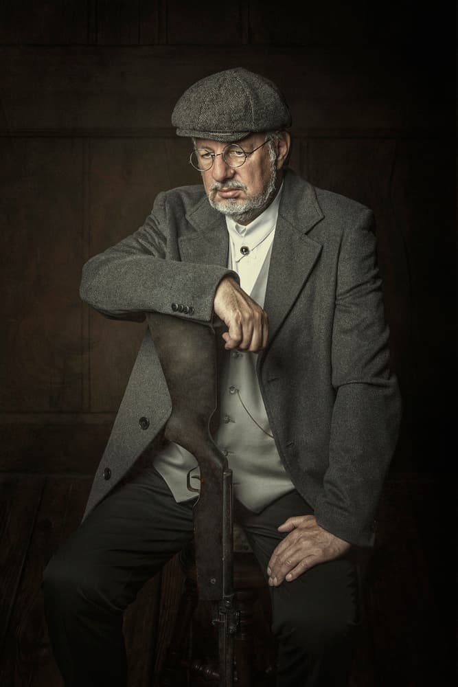 Thoughtful Man with Rifle by Carola Kayen-Mouthaan — canvas wall art