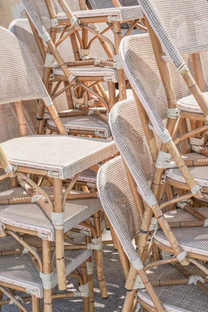 Stacked Bistro Chairs by Henrike Schenk — canvas wall art