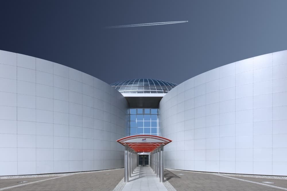 Curved Building Contrail by Markus Kühne — canvas wall art