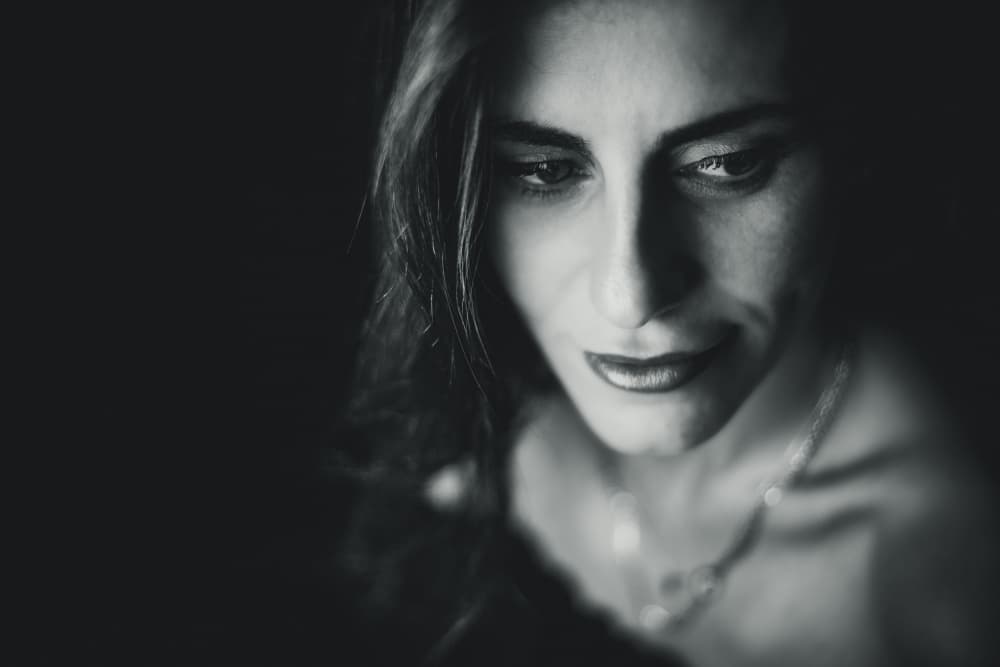Elegant Downward Gaze by M. Emre Erol — canvas wall art