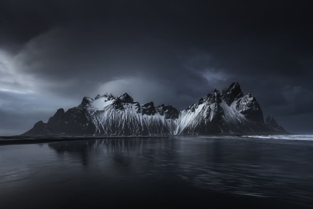 Dramatic Snowy Peaks Reflection by Jorge Ruiz Dueso — canvas wall art