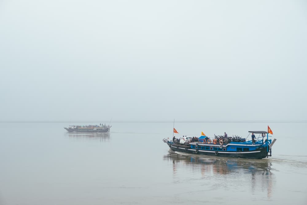 Misty River Boats by Dahlia Ambrose — canvas wall art