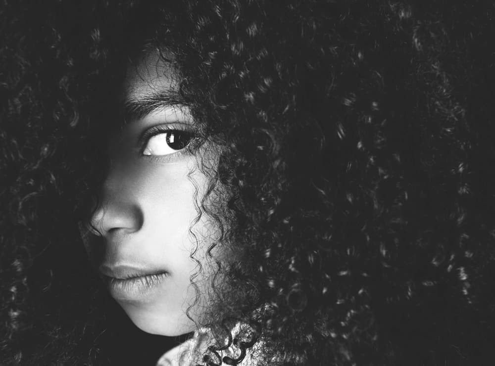Mysterious Curly Haired Girl by Bianca Dijck — canvas wall art