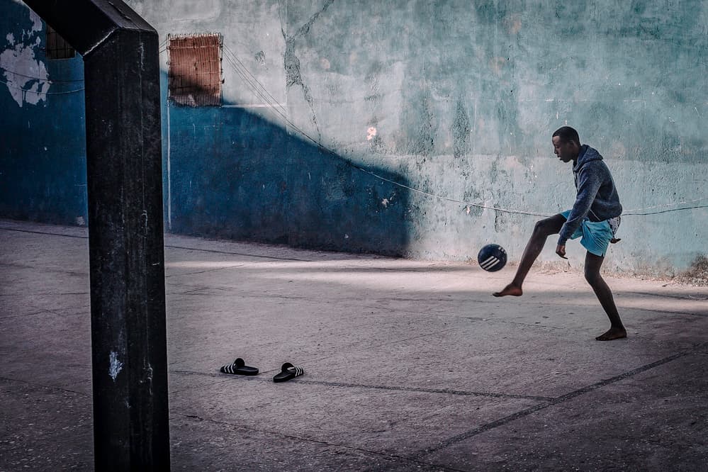 Barefoot Street Soccer by Andy Bauer — canvas wall art