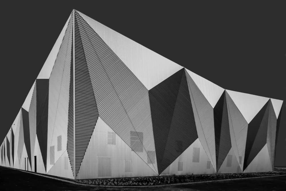 Striking Geometric Building by Theo Luycx — canvas wall art