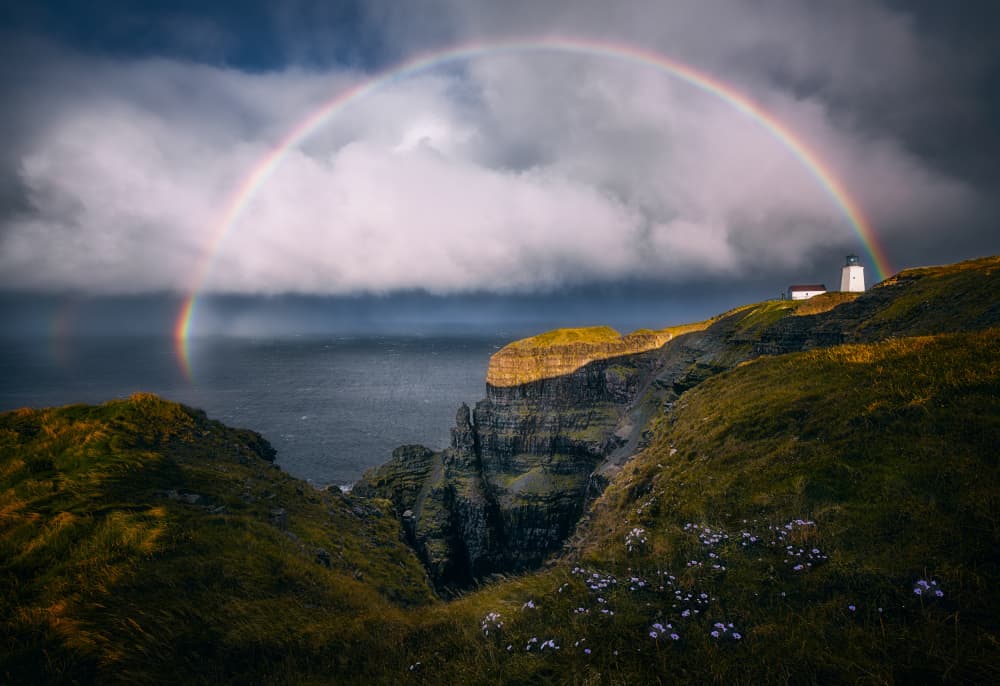 Dramatic Rainbow Lighthouse Cliffs by Ben.C.L — canvas wall art