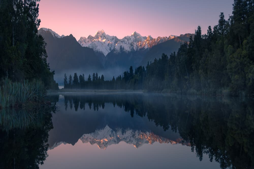 Pink Sky Mountain Reflection by Jingshu Zhu — canvas wall art