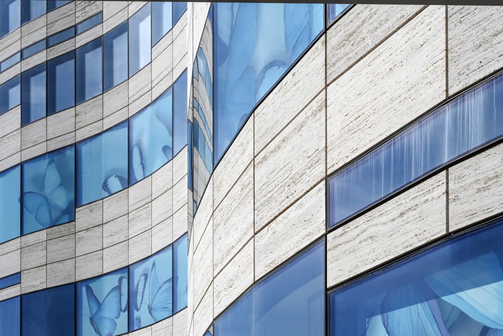 Curved Blue Glass Building by Linda Wride — canvas wall art