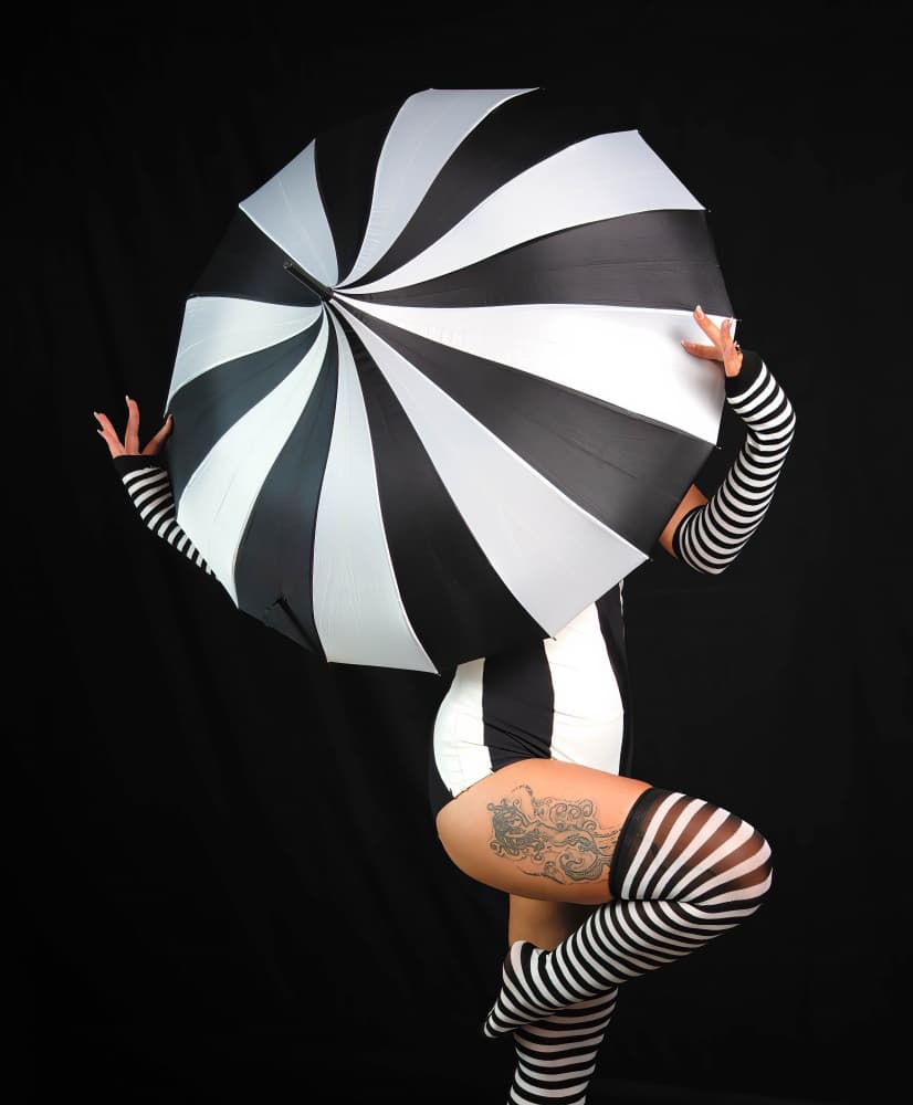 Whimsical Striped Umbrella Pose by Tali Stein — canvas wall art