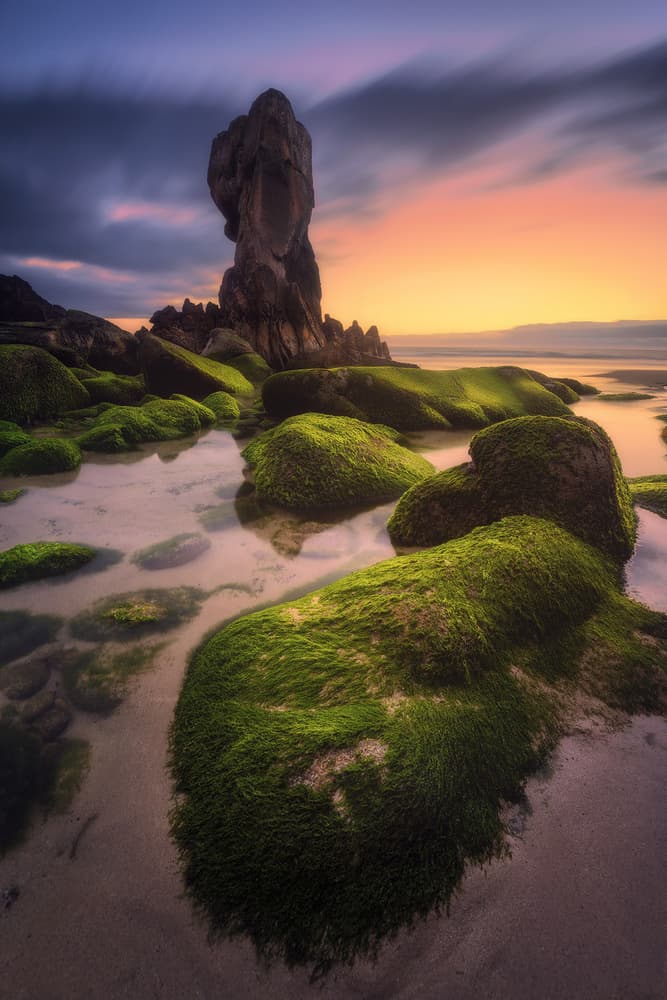 Towering Rock Coastal Sunset by Carlos F. Turienzo — canvas wall art