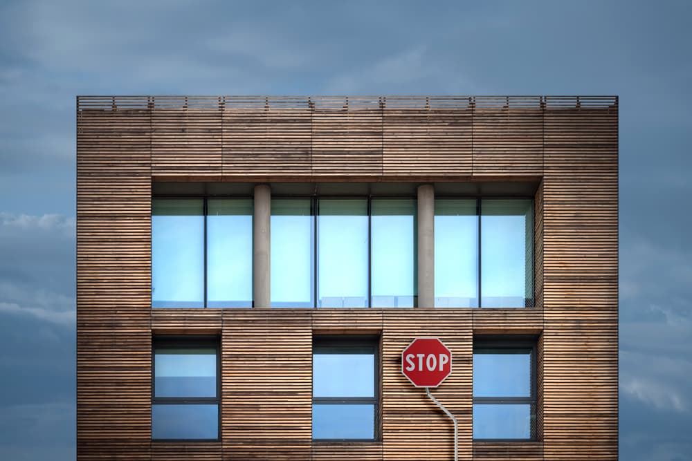 Modern Wood Building Stop by Andrea Comari — canvas wall art