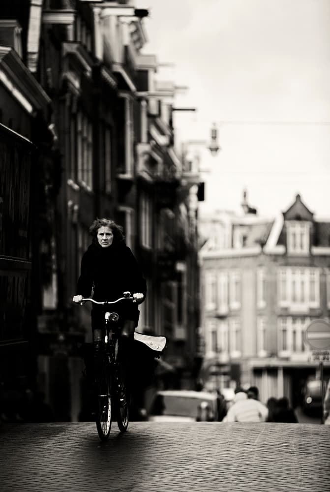 Urban Cycling in Monochrome by Julien Oncete — canvas wall art
