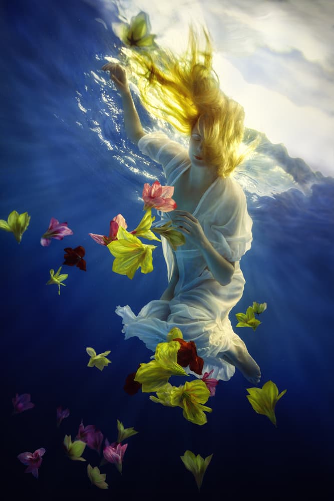 Ethereal Woman Floating Flowers by Dmitry Frizel — canvas wall art