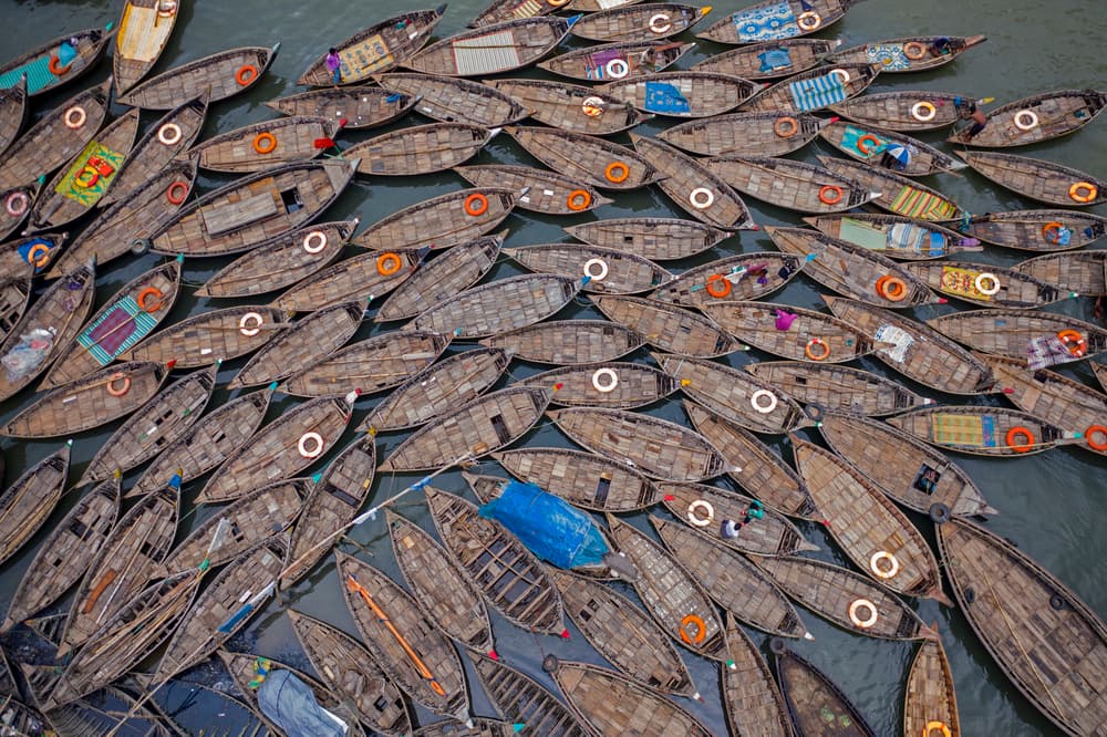 Crowded Wooden Boats by Azim Khan Ronnie — canvas wall art