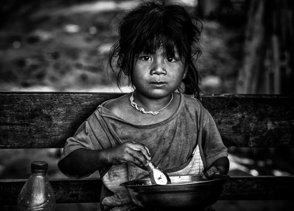 A Child's Meal by Joxe Inazio Kuesta Garmendia — canvas wall art