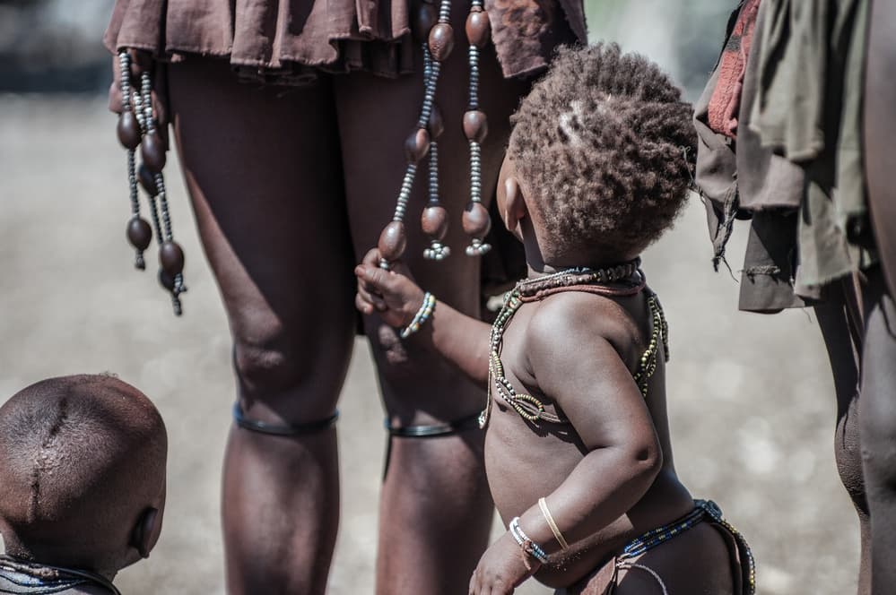 Tribal Child and Beads by Pavol Stranak — canvas wall art