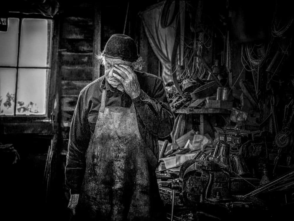 Weary Workshop Man by Frank Ma — canvas wall art